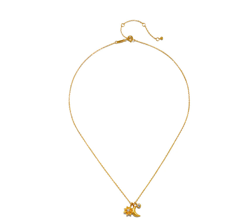 Protected by the goddess moon, we are free to transform into our most authentic selves. An 18kt gold plated necklace is adorned with a lotus flower, a crescent moon, and a white topaz star, inspiring new beginnings, offering protection and goddess energy,