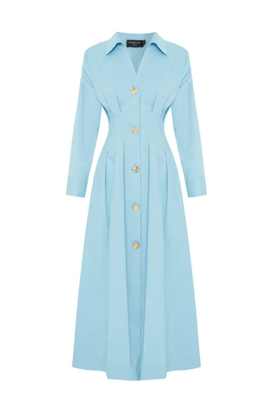 The Waist-Fitted Button-Detail Cotton Midi Shirt Dress effortlessly blends style and comfort with its natural cotton fabric, providing comfort all day long. The front button details and waist-fitted silhouette create a sleek and modern look. Ideal for bot